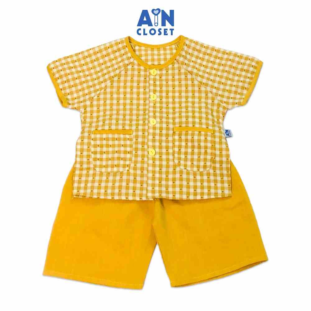 [Mã BMLT30 giảm đến 30K đơn 299K] Bộ quần áo bà ba lửng unisex họa tiết Caro vàng cotton - AICDBTA271LM - AIN Closet